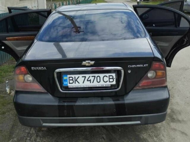 Черный Шевроле Эванда, объемом двигателя 2 л и пробегом 275 тыс. км за 2915 $, фото 1 на Automoto.ua