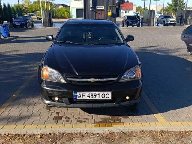 Чорний Шевроле Еванда, об'ємом двигуна 2 л та пробігом 232 тис. км за 3500 $, фото 4 на Automoto.ua