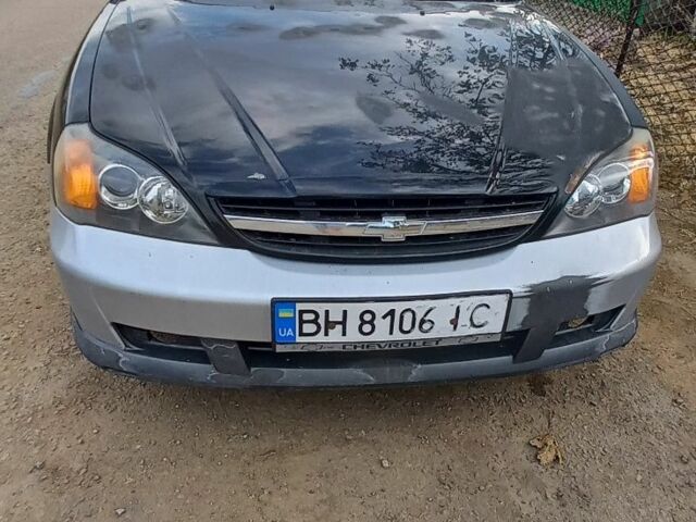 Чорний Шевроле Еванда, об'ємом двигуна 2 л та пробігом 280 тис. км за 2800 $, фото 4 на Automoto.ua