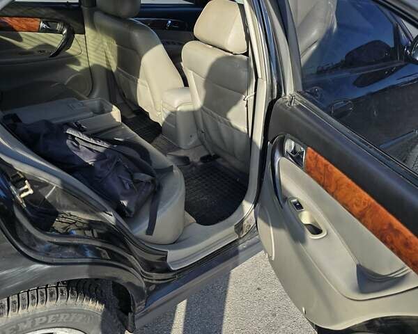 Чорний Шевроле Еванда, об'ємом двигуна 2 л та пробігом 290 тис. км за 2850 $, фото 18 на Automoto.ua