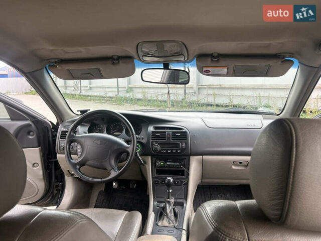 Черный Шевроле Эванда, объемом двигателя 2 л и пробегом 472 тыс. км за 2699 $, фото 18 на Automoto.ua