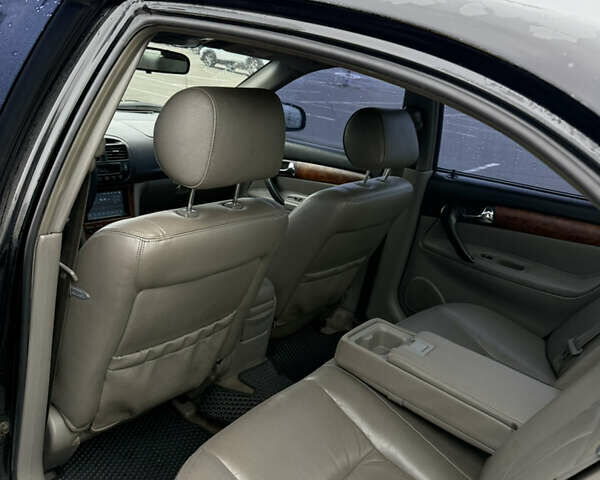 Чорний Шевроле Еванда, об'ємом двигуна 2 л та пробігом 299 тис. км за 3500 $, фото 7 на Automoto.ua