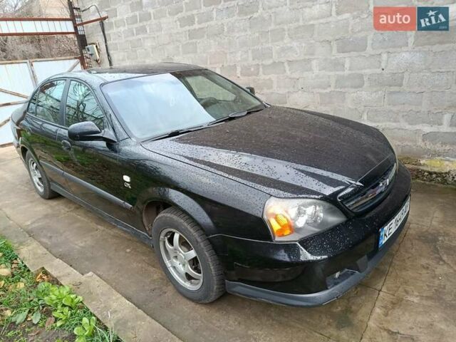 Черный Шевроле Эванда, объемом двигателя 2 л и пробегом 207 тыс. км за 4436 $, фото 1 на Automoto.ua