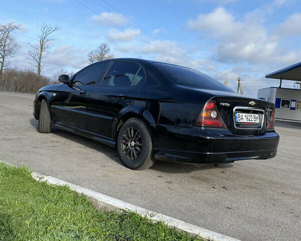 Чорний Шевроле Еванда, об'ємом двигуна 2 л та пробігом 181 тис. км за 5000 $, фото 5 на Automoto.ua