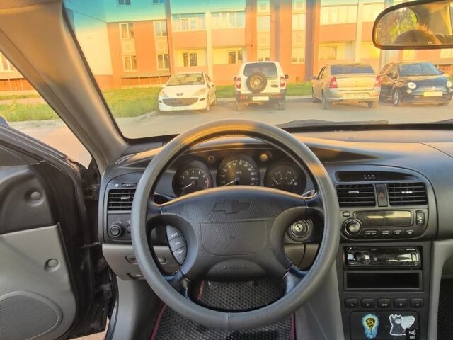 Черный Шевроле Эванда, объемом двигателя 2 л и пробегом 250 тыс. км за 4196 $, фото 6 на Automoto.ua