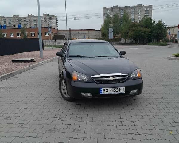 Чорний Шевроле Еванда, об'ємом двигуна 2 л та пробігом 160 тис. км за 4900 $, фото 8 на Automoto.ua