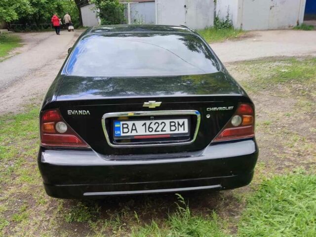 Черный Шевроле Эванда, объемом двигателя 2 л и пробегом 177 тыс. км за 4600 $, фото 1 на Automoto.ua