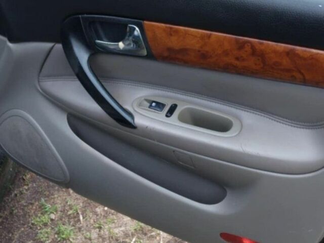 Черный Шевроле Эванда, объемом двигателя 2 л и пробегом 177 тыс. км за 4600 $, фото 7 на Automoto.ua