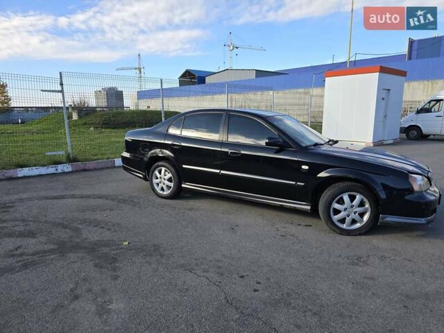 Чорний Шевроле Еванда, об'ємом двигуна 2 л та пробігом 290 тис. км за 2850 $, фото 4 на Automoto.ua