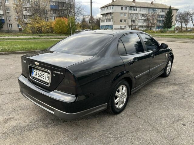 Черный Шевроле Эванда, объемом двигателя 2 л и пробегом 193 тыс. км за 4200 $, фото 5 на Automoto.ua