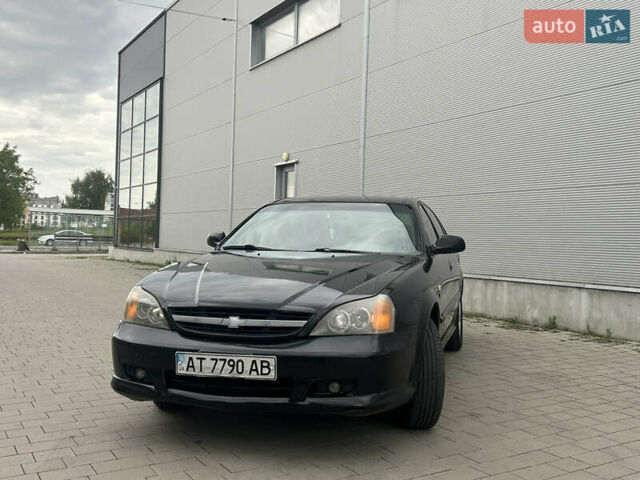 Черный Шевроле Эванда, объемом двигателя 2 л и пробегом 472 тыс. км за 2699 $, фото 3 на Automoto.ua