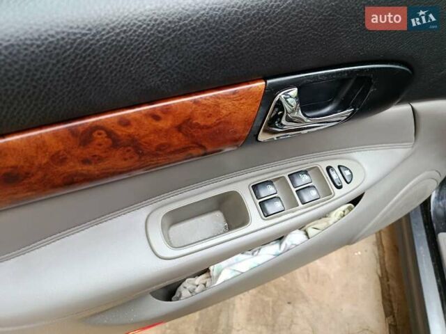 Черный Шевроле Эванда, объемом двигателя 2 л и пробегом 207 тыс. км за 4436 $, фото 8 на Automoto.ua