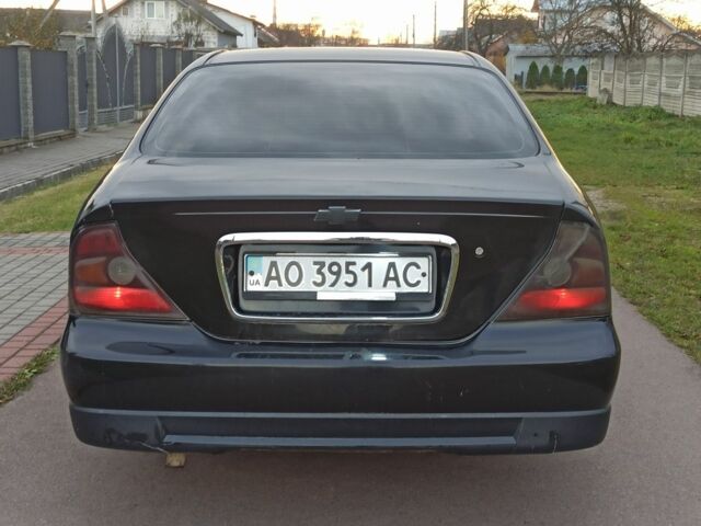 Черный Шевроле Эванда, объемом двигателя 0 л и пробегом 300 тыс. км за 2200 $, фото 5 на Automoto.ua