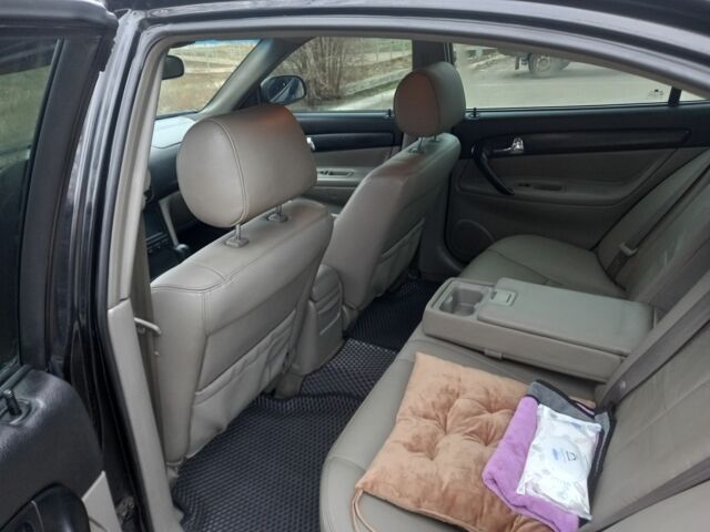 Черный Шевроле Эванда, объемом двигателя 2 л и пробегом 198 тыс. км за 4500 $, фото 3 на Automoto.ua