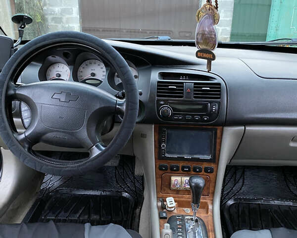 Чорний Шевроле Еванда, об'ємом двигуна 2 л та пробігом 181 тис. км за 5000 $, фото 9 на Automoto.ua