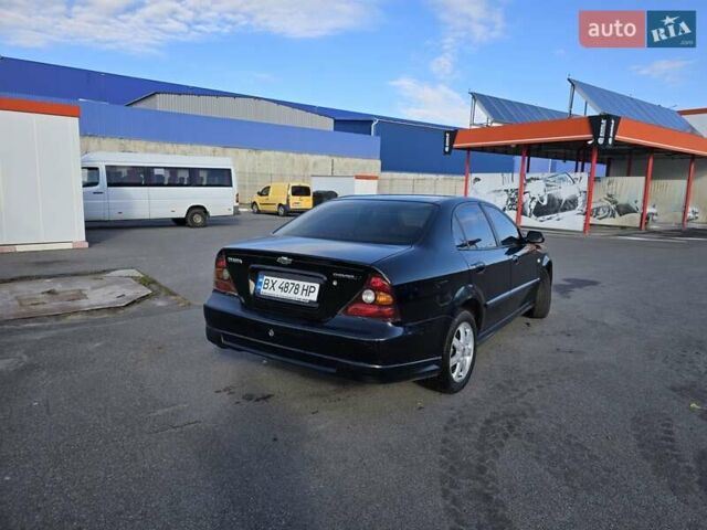 Чорний Шевроле Еванда, об'ємом двигуна 2 л та пробігом 290 тис. км за 2850 $, фото 5 на Automoto.ua