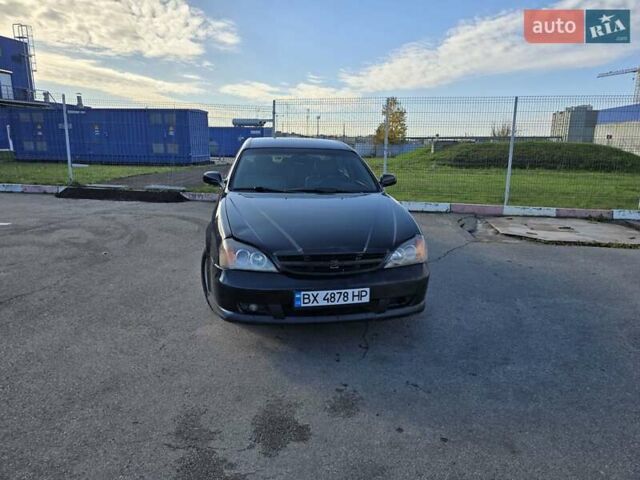 Чорний Шевроле Еванда, об'ємом двигуна 2 л та пробігом 290 тис. км за 2850 $, фото 1 на Automoto.ua
