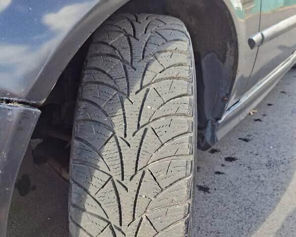 Чорний Шевроле Еванда, об'ємом двигуна 2 л та пробігом 280 тис. км за 3899 $, фото 1 на Automoto.ua