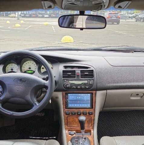 Черный Шевроле Эванда, объемом двигателя 2 л и пробегом 350 тыс. км за 3400 $, фото 6 на Automoto.ua