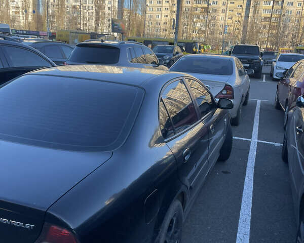 Чорний Шевроле Еванда, об'ємом двигуна 2 л та пробігом 292 тис. км за 3000 $, фото 9 на Automoto.ua