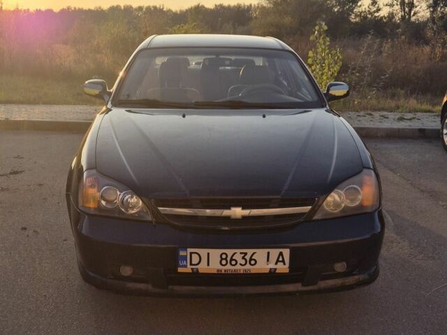 Черный Шевроле Эванда, объемом двигателя 2 л и пробегом 250 тыс. км за 4196 $, фото 1 на Automoto.ua