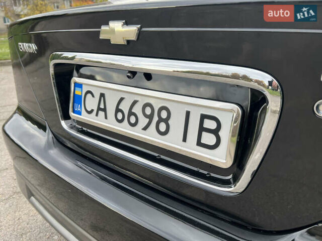 Черный Шевроле Эванда, объемом двигателя 2 л и пробегом 193 тыс. км за 4200 $, фото 21 на Automoto.ua