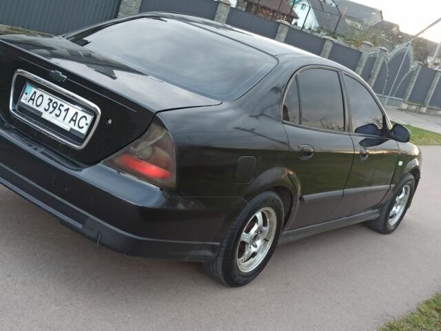 Черный Шевроле Эванда, объемом двигателя 0 л и пробегом 300 тыс. км за 2200 $, фото 4 на Automoto.ua