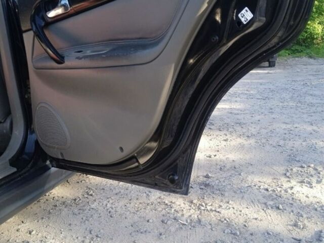 Чорний Шевроле Еванда, об'ємом двигуна 2 л та пробігом 160 тис. км за 2499 $, фото 7 на Automoto.ua