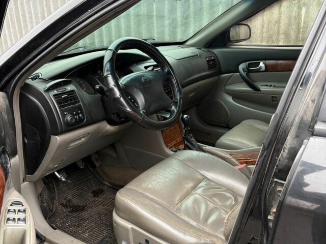 Черный Шевроле Эванда, объемом двигателя 2 л и пробегом 3 тыс. км за 2200 $, фото 3 на Automoto.ua