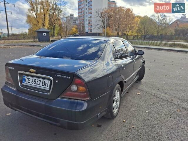 Чорний Шевроле Еванда, об'ємом двигуна 2 л та пробігом 280 тис. км за 3899 $, фото 3 на Automoto.ua