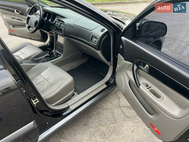 Черный Шевроле Эванда, объемом двигателя 2 л и пробегом 193 тыс. км за 4200 $, фото 14 на Automoto.ua