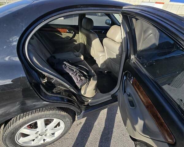 Чорний Шевроле Еванда, об'ємом двигуна 2 л та пробігом 290 тис. км за 2850 $, фото 19 на Automoto.ua