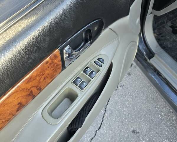 Чорний Шевроле Еванда, об'ємом двигуна 2 л та пробігом 290 тис. км за 2850 $, фото 11 на Automoto.ua