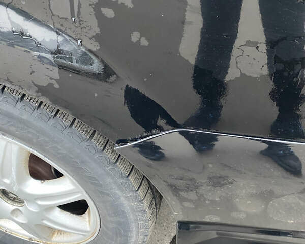 Чорний Шевроле Еванда, об'ємом двигуна 2 л та пробігом 235 тис. км за 3500 $, фото 18 на Automoto.ua