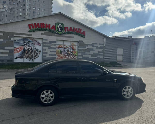 Черный Шевроле Эванда, объемом двигателя 2 л и пробегом 320 тыс. км за 3200 $, фото 7 на Automoto.ua