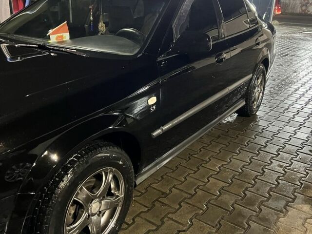 Черный Шевроле Эванда, объемом двигателя 2 л и пробегом 3 тыс. км за 5200 $, фото 2 на Automoto.ua