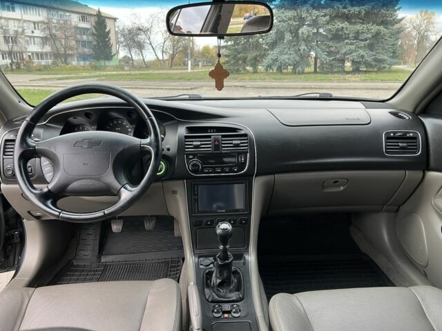 Черный Шевроле Эванда, объемом двигателя 2 л и пробегом 193 тыс. км за 4200 $, фото 14 на Automoto.ua