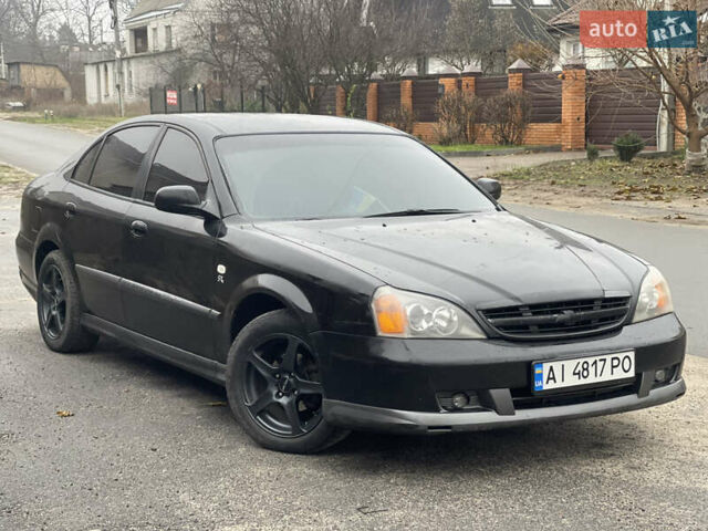 Чорний Шевроле Еванда, об'ємом двигуна 2 л та пробігом 292 тис. км за 3000 $, фото 1 на Automoto.ua