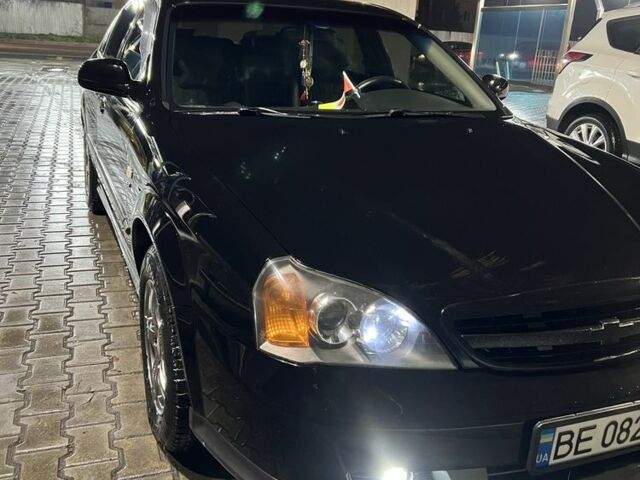 Черный Шевроле Эванда, объемом двигателя 2 л и пробегом 3 тыс. км за 5200 $, фото 4 на Automoto.ua