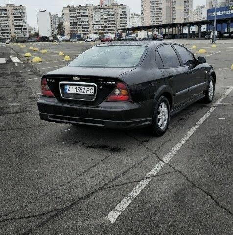 Черный Шевроле Эванда, объемом двигателя 2 л и пробегом 350 тыс. км за 3400 $, фото 3 на Automoto.ua