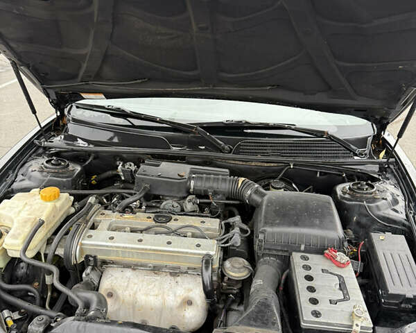 Чорний Шевроле Еванда, об'ємом двигуна 2 л та пробігом 299 тис. км за 3500 $, фото 10 на Automoto.ua