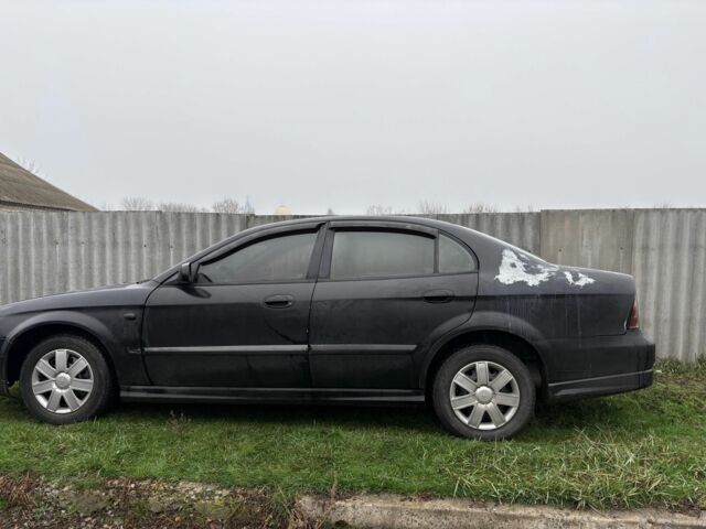Черный Шевроле Эванда, объемом двигателя 2 л и пробегом 3 тыс. км за 2200 $, фото 1 на Automoto.ua