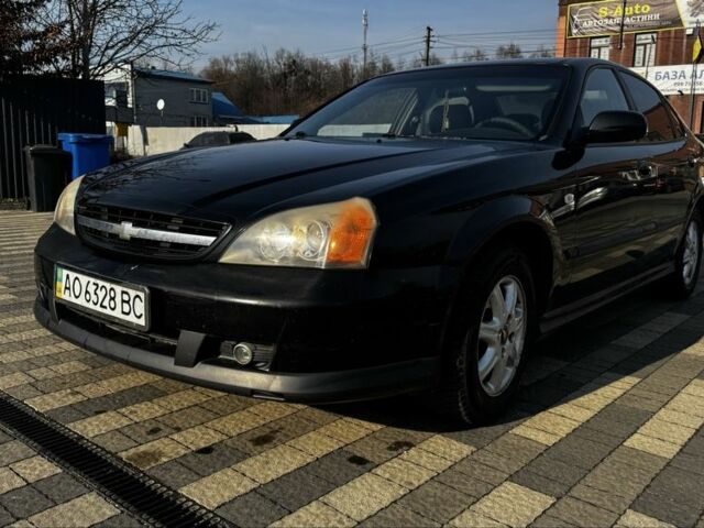 Черный Шевроле Эванда, объемом двигателя 2 л и пробегом 252 тыс. км за 2800 $, фото 1 на Automoto.ua
