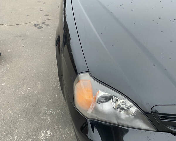 Чорний Шевроле Еванда, об'ємом двигуна 2 л та пробігом 235 тис. км за 3500 $, фото 50 на Automoto.ua