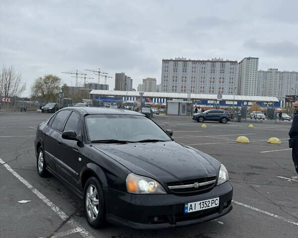 Чорний Шевроле Еванда, об'ємом двигуна 2 л та пробігом 299 тис. км за 3500 $, фото 5 на Automoto.ua