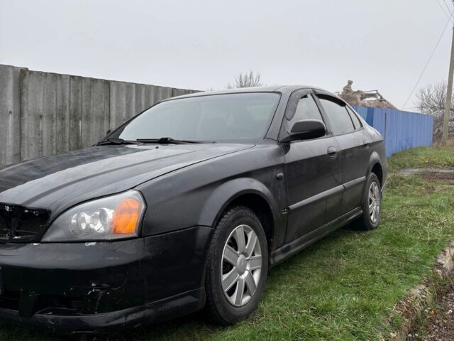 Черный Шевроле Эванда, объемом двигателя 2 л и пробегом 3 тыс. км за 2200 $, фото 4 на Automoto.ua