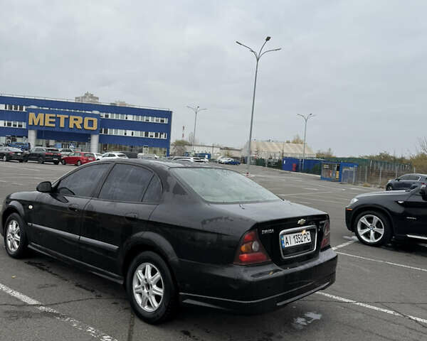 Чорний Шевроле Еванда, об'ємом двигуна 2 л та пробігом 299 тис. км за 3500 $, фото 4 на Automoto.ua