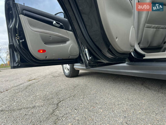 Черный Шевроле Эванда, объемом двигателя 2 л и пробегом 193 тыс. км за 4200 $, фото 22 на Automoto.ua