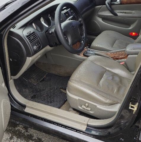 Черный Шевроле Эванда, объемом двигателя 2 л и пробегом 350 тыс. км за 3400 $, фото 4 на Automoto.ua