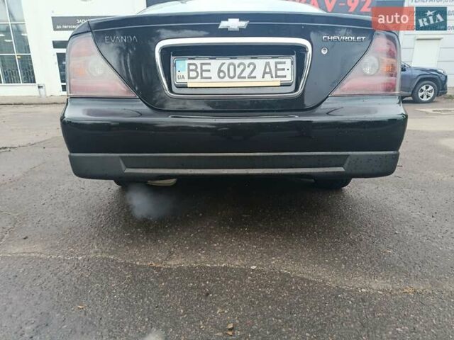 Чорний Шевроле Еванда, об'ємом двигуна 2 л та пробігом 355 тис. км за 3500 $, фото 7 на Automoto.ua